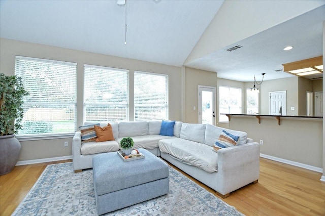 2012 Wood Glen Dr, Round Rock, TX 78681 - living room with baseboards, light wood-style floors, lofted ceiling, and recessed lighting