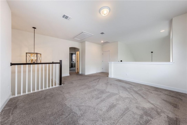 748 Hazy Hills Loop, Dripping Springs, TX 78620 - empty room featuring carpet flooring, arched walkways, baseboards, and recessed lighting