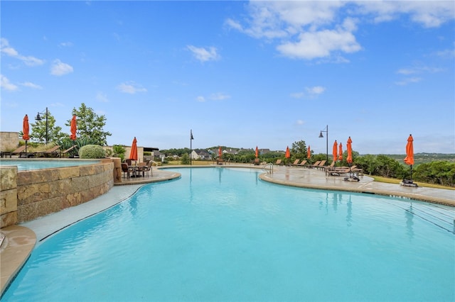 748 Hazy Hills Loop, Dripping Springs, TX 78620 - community pool with a patio area