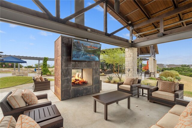 748 Hazy Hills Loop, Dripping Springs, TX 78620 - view of patio with an outdoor living space with a fireplace and a gazebo