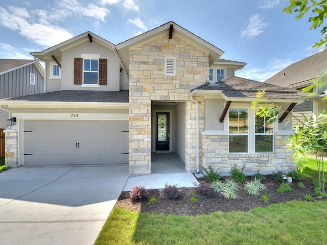 748 Hazy Hills Loop, Dripping Springs, TX 78620 - view of front facade with stone siding, concrete driveway, and a shingled roof