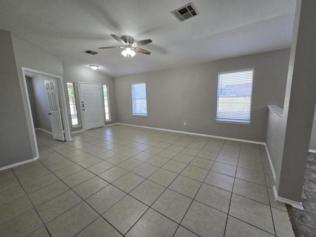 13820 Ceylon Tea Cir, Pflugerville, TX 78660 - entryway with a ceiling fan, light tile patterned flooring, baseboards, and lofted ceiling