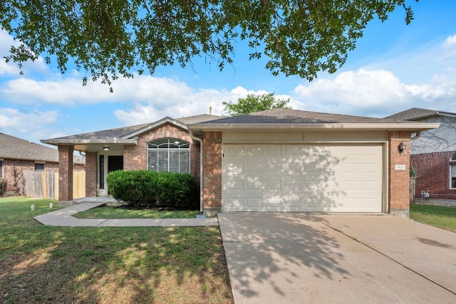 13820 Ceylon Tea Cir, Pflugerville, TX 78660 - ranch-style home with a garage, driveway, brick siding, and a front yard