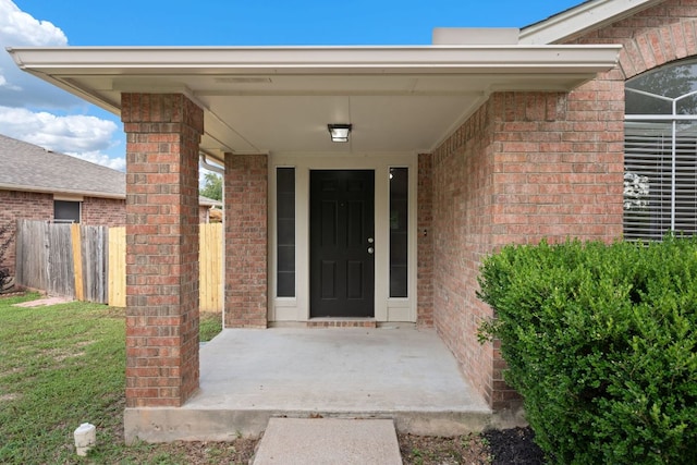 13820 Ceylon Tea Cir, Pflugerville, TX 78660 - doorway to property featuring brick siding
