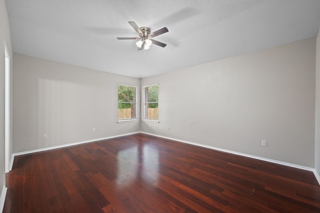 13820 Ceylon Tea Cir, Pflugerville, TX 78660 - empty room featuring a ceiling fan, wood finished floors, and baseboards