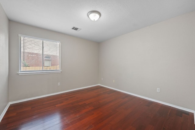 13820 Ceylon Tea Cir, Pflugerville, TX 78660 - empty room with wood finished floors and baseboards