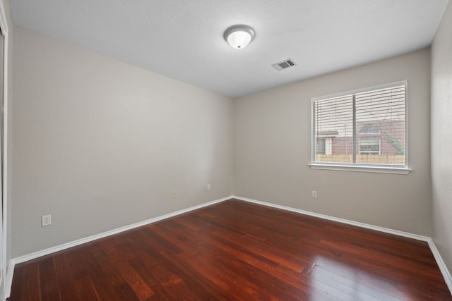 13820 Ceylon Tea Cir, Pflugerville, TX 78660 - empty room featuring wood finished floors and baseboards