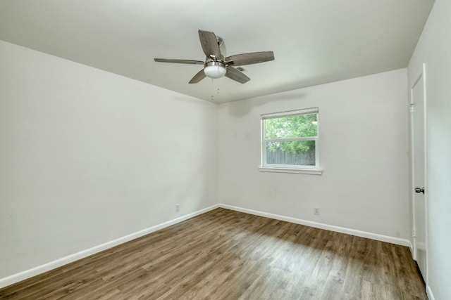9001 Lodge Ct, Austin, TX 78758 - empty room with wood finished floors and a ceiling fan
