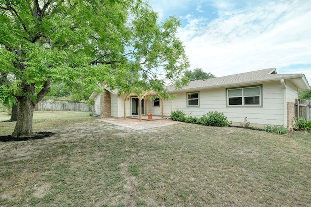9001 Lodge Ct, Austin, TX 78758 - rear view of house with a patio