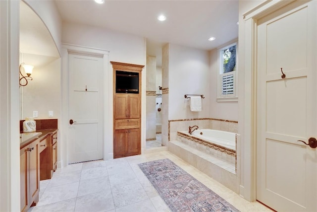7116 Greenshores Dr, Austin, TX 78730 - bathroom featuring vanity, a bath, tile patterned floors, recessed lighting, and a tile shower