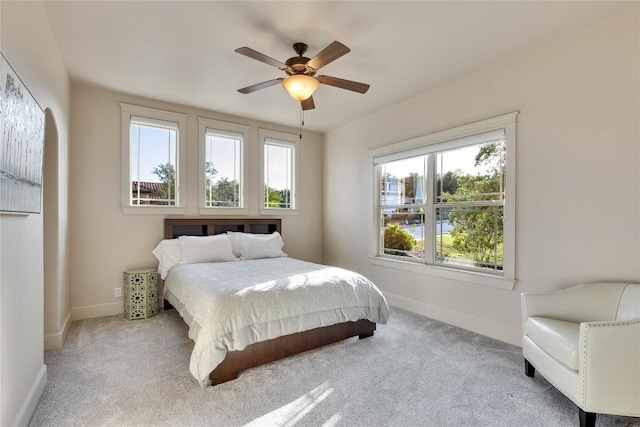 7116 Greenshores Dr, Austin, TX 78730 - bedroom featuring baseboards, carpet, and a ceiling fan