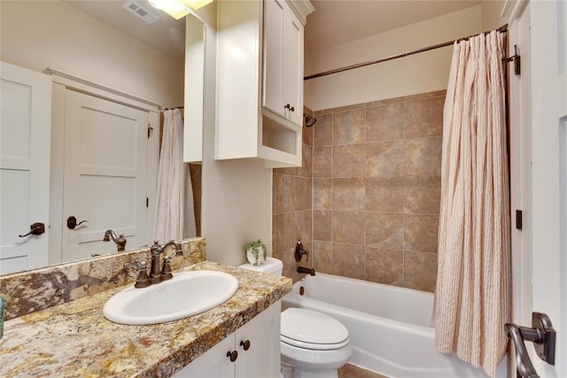 7116 Greenshores Dr, Austin, TX 78730 - bathroom featuring vanity, toilet, and shower / tub combo with curtain