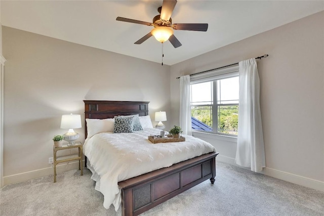 7116 Greenshores Dr, Austin, TX 78730 - bedroom with light colored carpet, baseboards, and ceiling fan