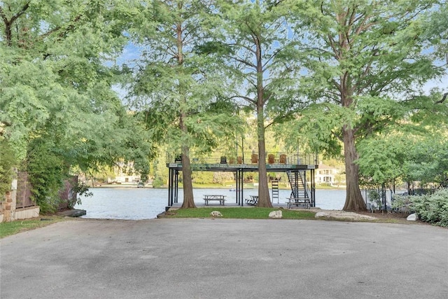 7116 Greenshores Dr, Austin, TX 78730 - view of front of home featuring a water view and stairway