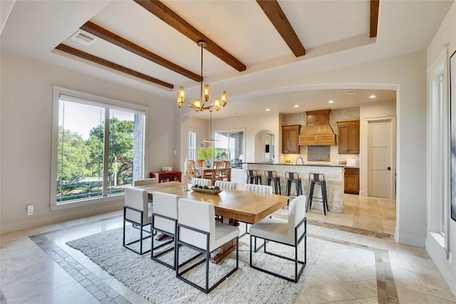 7116 Greenshores Dr, Austin, TX 78730 - dining area featuring inlaid floor details, baseboards, a chandelier, beamed ceiling, and recessed lighting