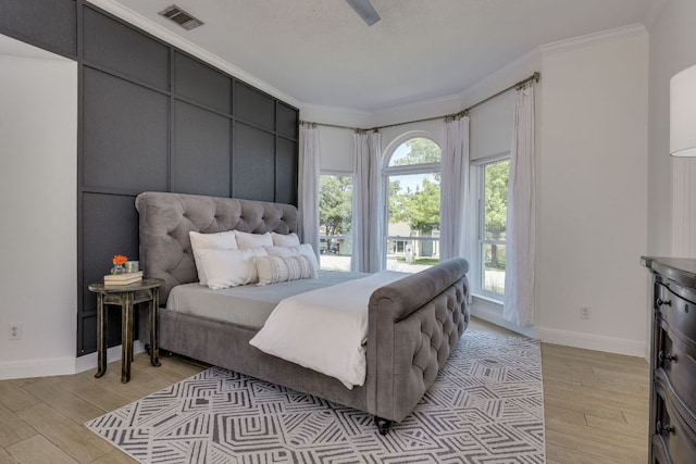 101 Peterson Ct, Austin, TX 78734 - bedroom with crown molding, light wood-style floors, and baseboards