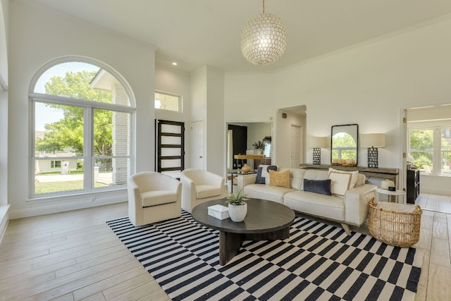 101 Peterson Ct, Austin, TX 78734 - living room with a towering ceiling, wood finished floors, and crown molding