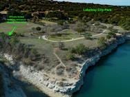 101 Peterson Ct, Austin, TX 78734 - aerial overview of property's location with a nearby body of water