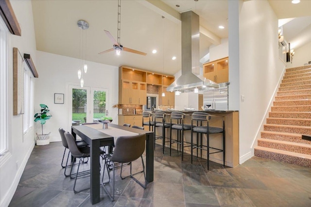 4715 Highland Ter, Austin, TX 78731 - dining space with ceiling fan, stairs, high vaulted ceiling, and recessed lighting
