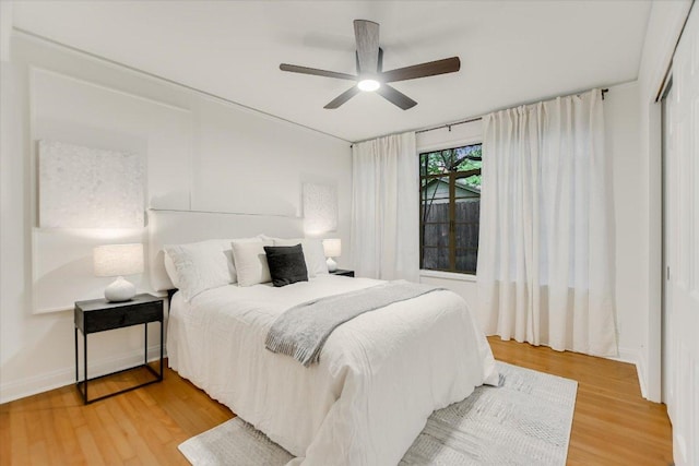 4715 Highland Ter, Austin, TX 78731 - bedroom featuring light wood-style floors, a ceiling fan, and a closet