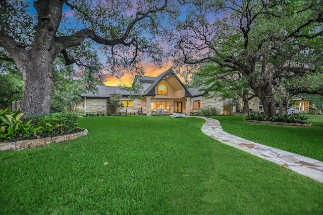 4715 Highland Ter, Austin, TX 78731 - view of front of house featuring stone siding and a front yard