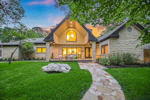 4715 Highland Ter, Austin, TX 78731 - view of front of property with stone siding and a yard
