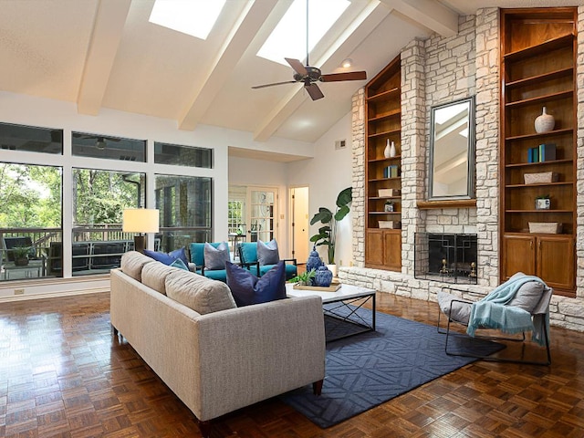 1400 Pearl Cv, Round Rock, TX 78681 - living room with beam ceiling, a stone fireplace, high vaulted ceiling, ceiling fan, and built in features