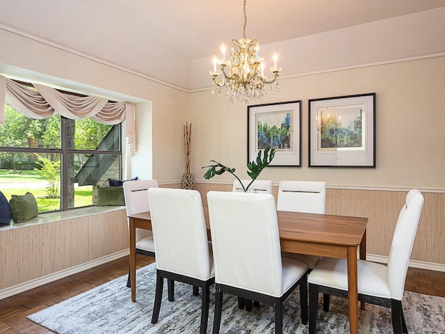 1400 Pearl Cv, Round Rock, TX 78681 - dining space featuring a chandelier and wood walls