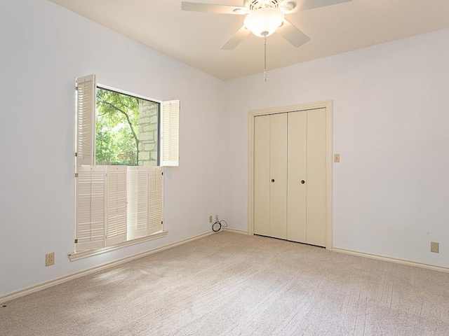 1400 Pearl Cv, Round Rock, TX 78681 - unfurnished bedroom featuring carpet, ceiling fan, and a closet