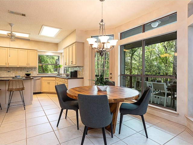1400 Pearl Cv, Round Rock, TX 78681 - dining space with a chandelier and light tile patterned floors