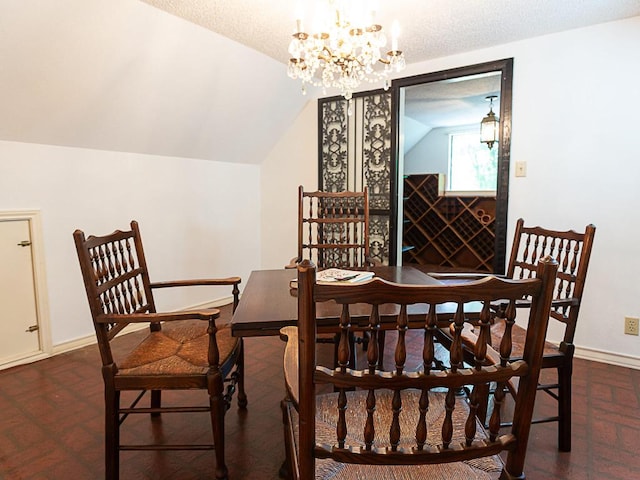 1400 Pearl Cv, Round Rock, TX 78681 - dining room featuring vaulted ceiling and a chandelier