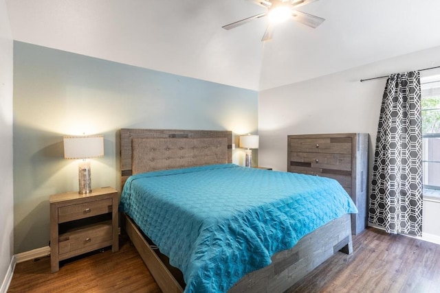 10 Lakewood Cir, Wimberley, TX 78676 - bedroom with wood finished floors, baseboards, ceiling fan, and vaulted ceiling