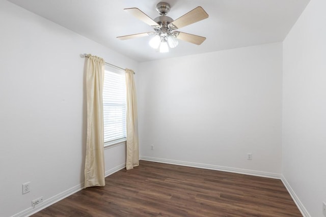 10 Lakewood Cir, Wimberley, TX 78676 - empty room featuring dark wood-type flooring, baseboards, and ceiling fan