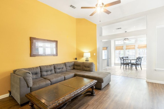 10 Lakewood Cir, Wimberley, TX 78676 - living area with ceiling fan, baseboards, high vaulted ceiling, and wood finished floors