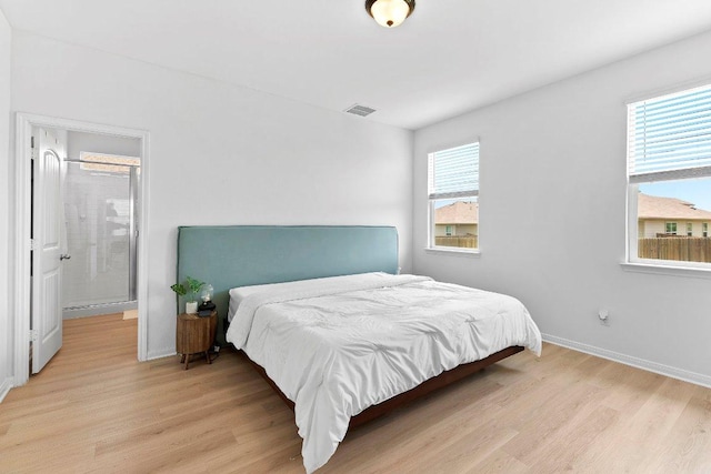 114 Ashford Way, Georgetown, TX 78626 - bedroom featuring light wood finished floors and baseboards