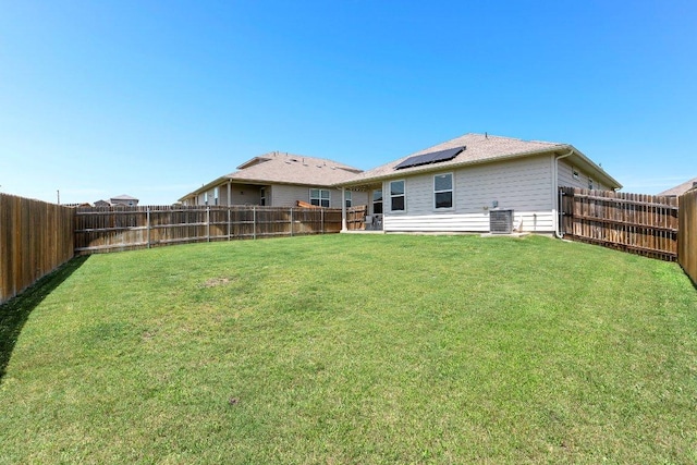 114 Ashford Way, Georgetown, TX 78626 - back of property featuring roof mounted solar panels and central AC unit