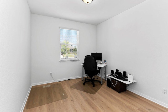 114 Ashford Way, Georgetown, TX 78626 - home office with wood finished floors and baseboards