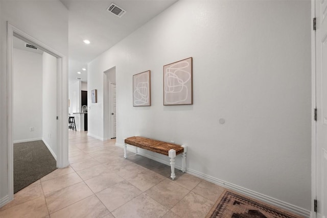13002 Stanford Dr Unit 40, Austin, TX 78748 - corridor with recessed lighting, light tile patterned floors, and baseboards