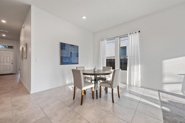 13002 Stanford Dr Unit 40, Austin, TX 78748 - dining room featuring healthy amount of natural light, light tile patterned floors, baseboards, and recessed lighting