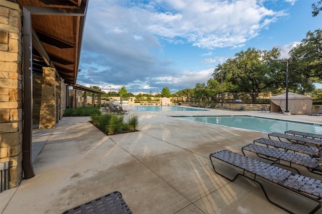 13002 Stanford Dr Unit 40, Austin, TX 78748 - community pool featuring a patio area