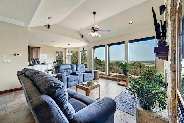 21012 N Rdg, Lago Vista, TX 78645 - living room featuring vaulted ceiling, a ceiling fan, recessed lighting, and baseboards