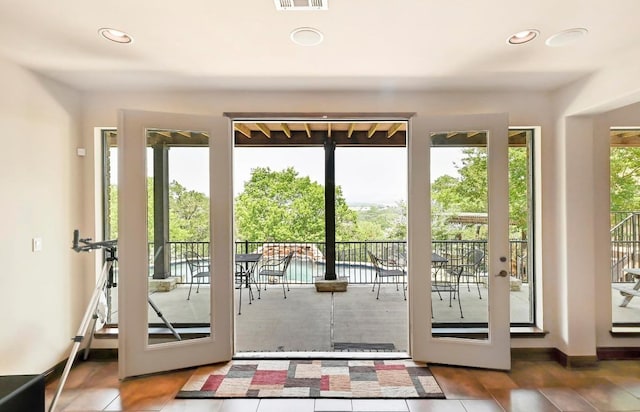 21012 N Rdg, Lago Vista, TX 78645 - doorway with recessed lighting and tile patterned floors