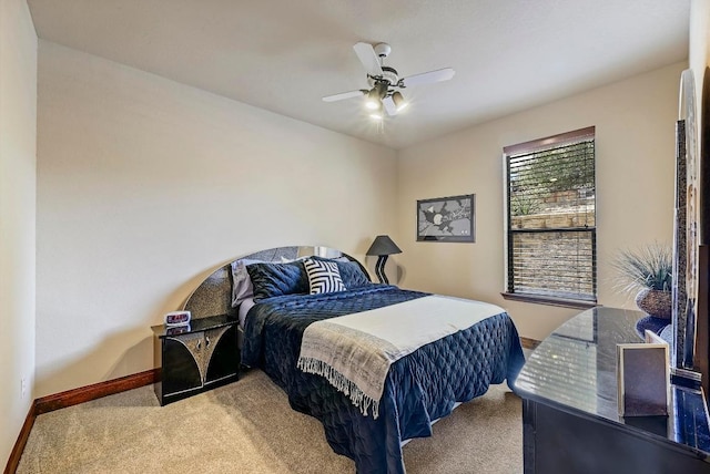 21012 N Rdg, Lago Vista, TX 78645 - bedroom featuring carpet flooring, baseboards, and a ceiling fan