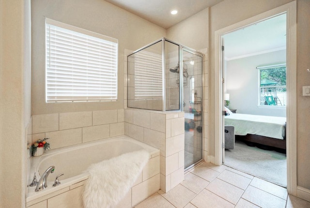 20304 Thumper Jack Ct, Pflugerville, TX 78660 - bathroom featuring a shower stall, a bath, ensuite bathroom, and tile patterned floors