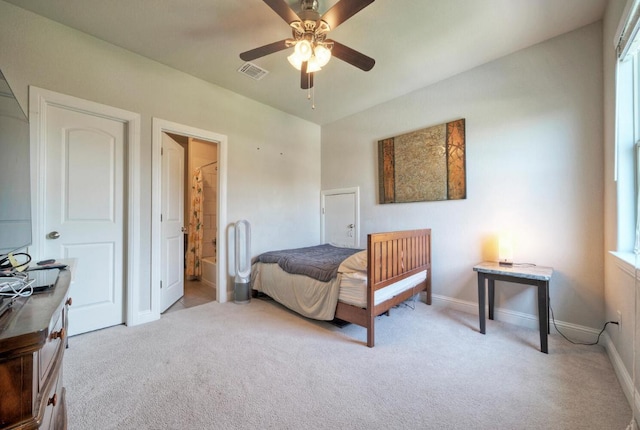 20304 Thumper Jack Ct, Pflugerville, TX 78660 - carpeted bedroom with baseboards, ensuite bath, and a ceiling fan
