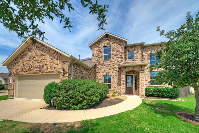 20304 Thumper Jack Ct, Pflugerville, TX 78660 - traditional home with an attached garage, a front lawn, driveway, and brick siding