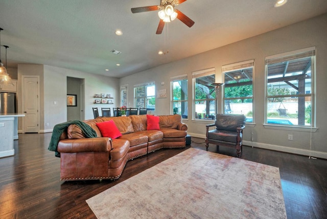 20304 Thumper Jack Ct, Pflugerville, TX 78660 - living room with dark wood finished floors, baseboards, ceiling fan, and recessed lighting