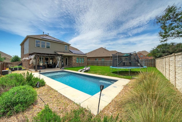 20304 Thumper Jack Ct, Pflugerville, TX 78660 - view of pool featuring a trampoline and a patio area