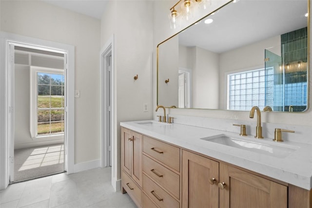 206 High Plains Dr, Dripping Springs, TX 78620 - bathroom with double vanity and tile patterned flooring