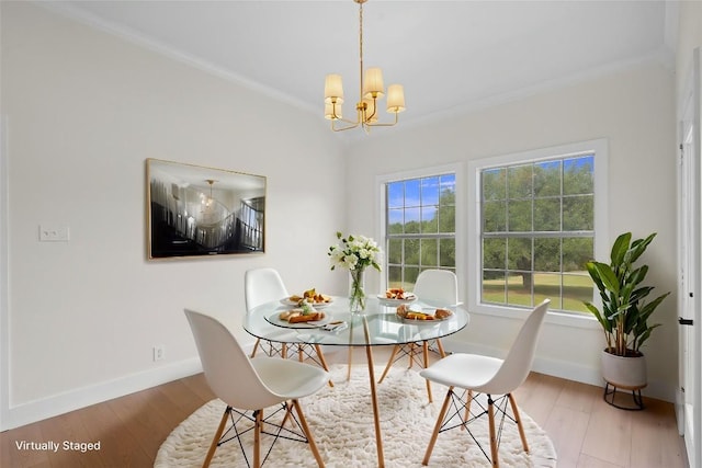 206 High Plains Dr, Dripping Springs, TX 78620 - dining area with ornamental molding, a chandelier, wood finished floors, and baseboards